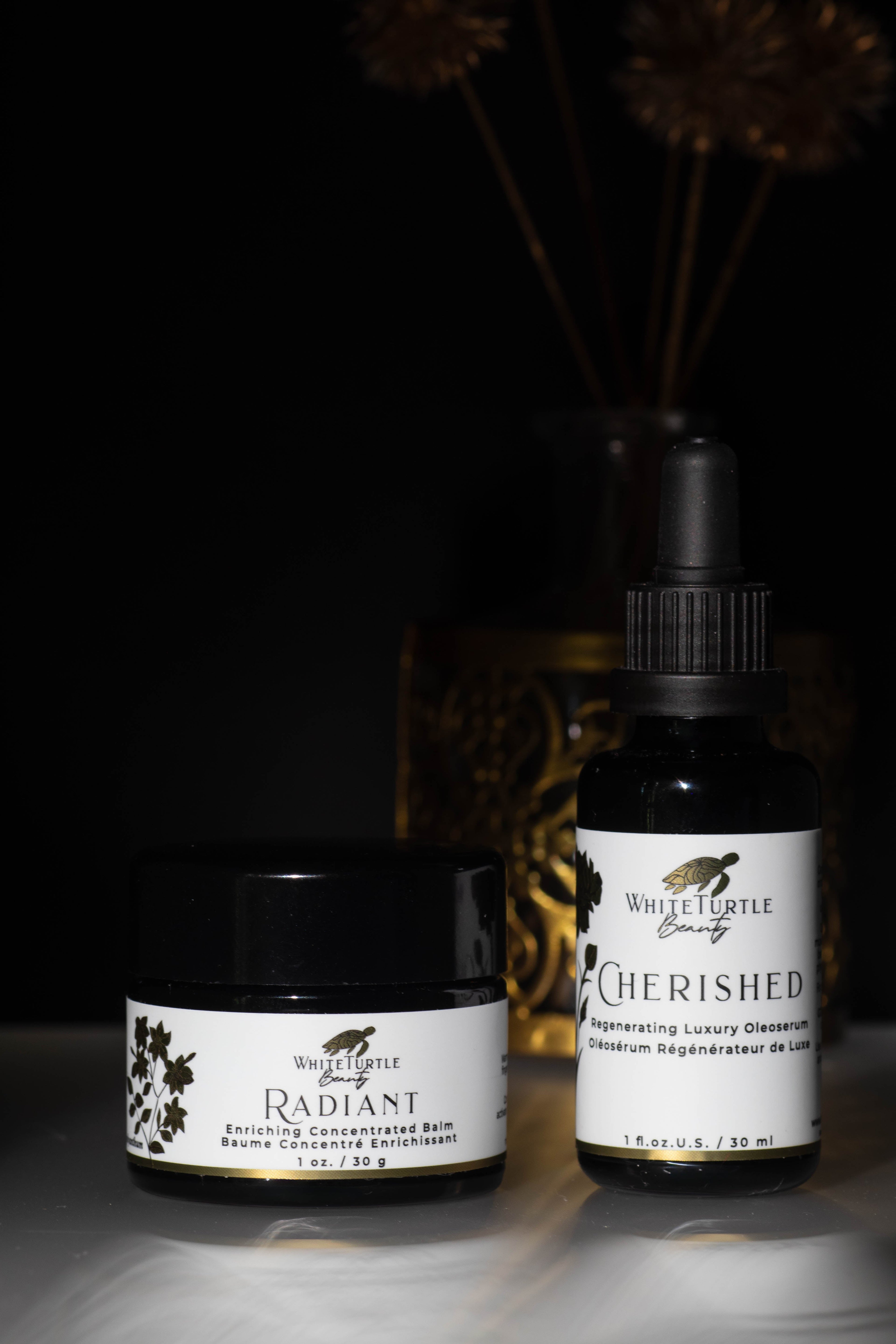 Luxury botanical skincare products and facial tools for a radiant, glowing complexion