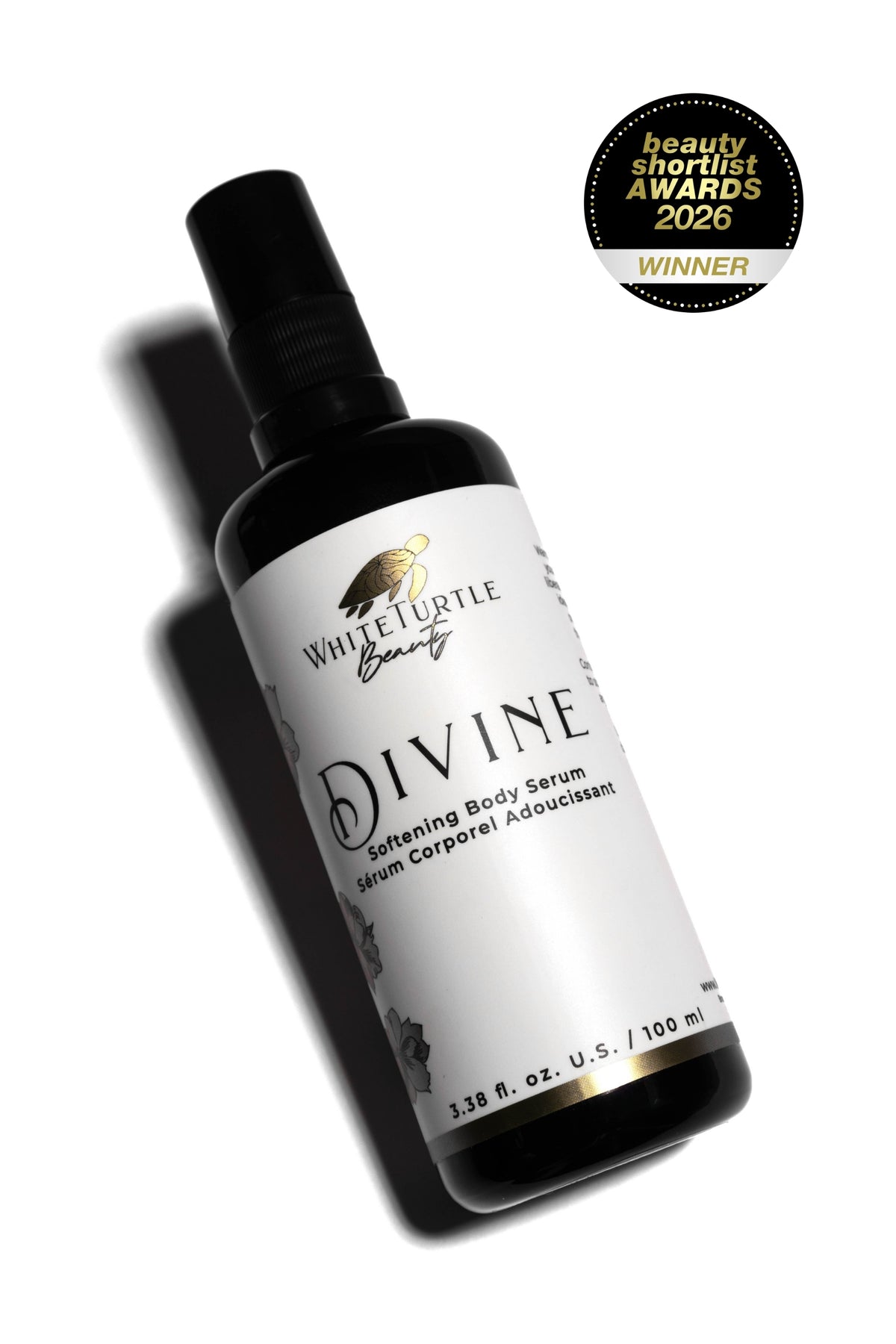 Bottle of Divine body serum from White Turtle Beauty with a 'Winner' badge on a white background