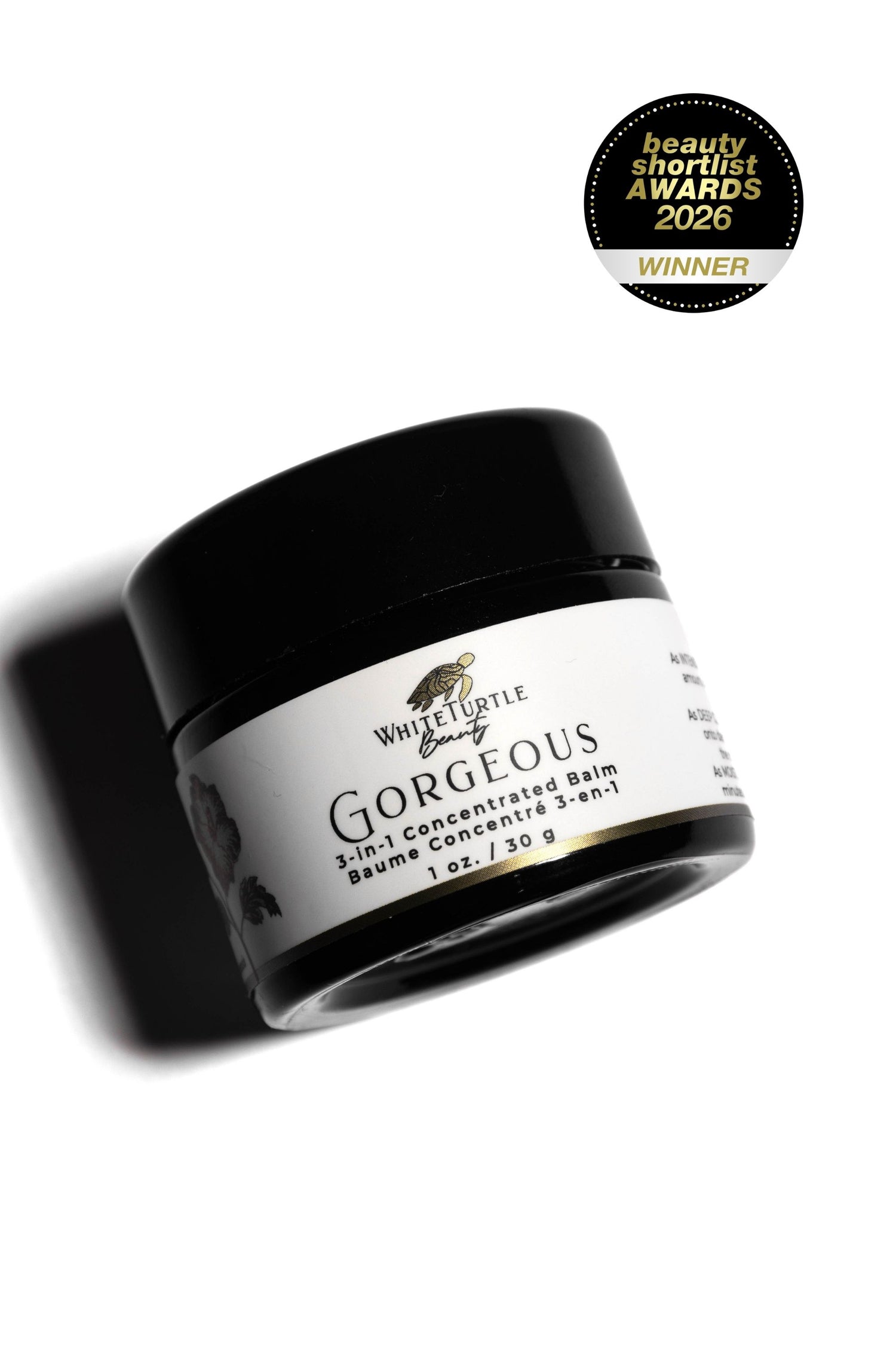Black jar of 'Gorgeous' balm from White Turtle Beauty on a white background, featuring an award badge.