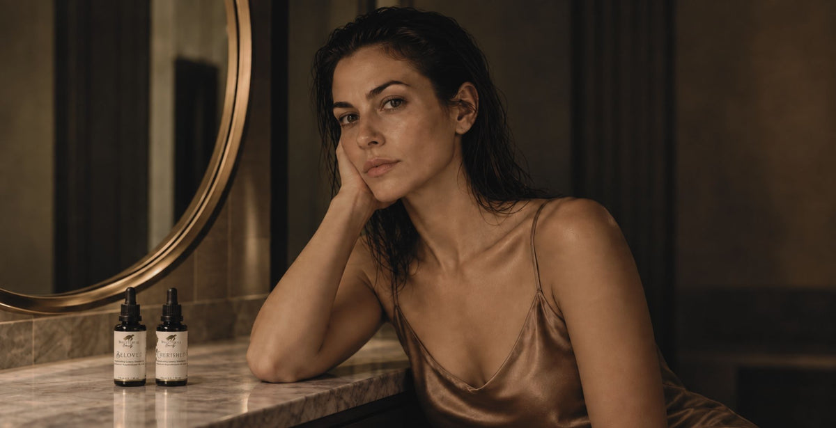 A woman leans on a marble counter next to White Turtle Beauty skincare