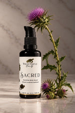 A bottle of White Turtle Beauty Sacred Soothing Body Serum 