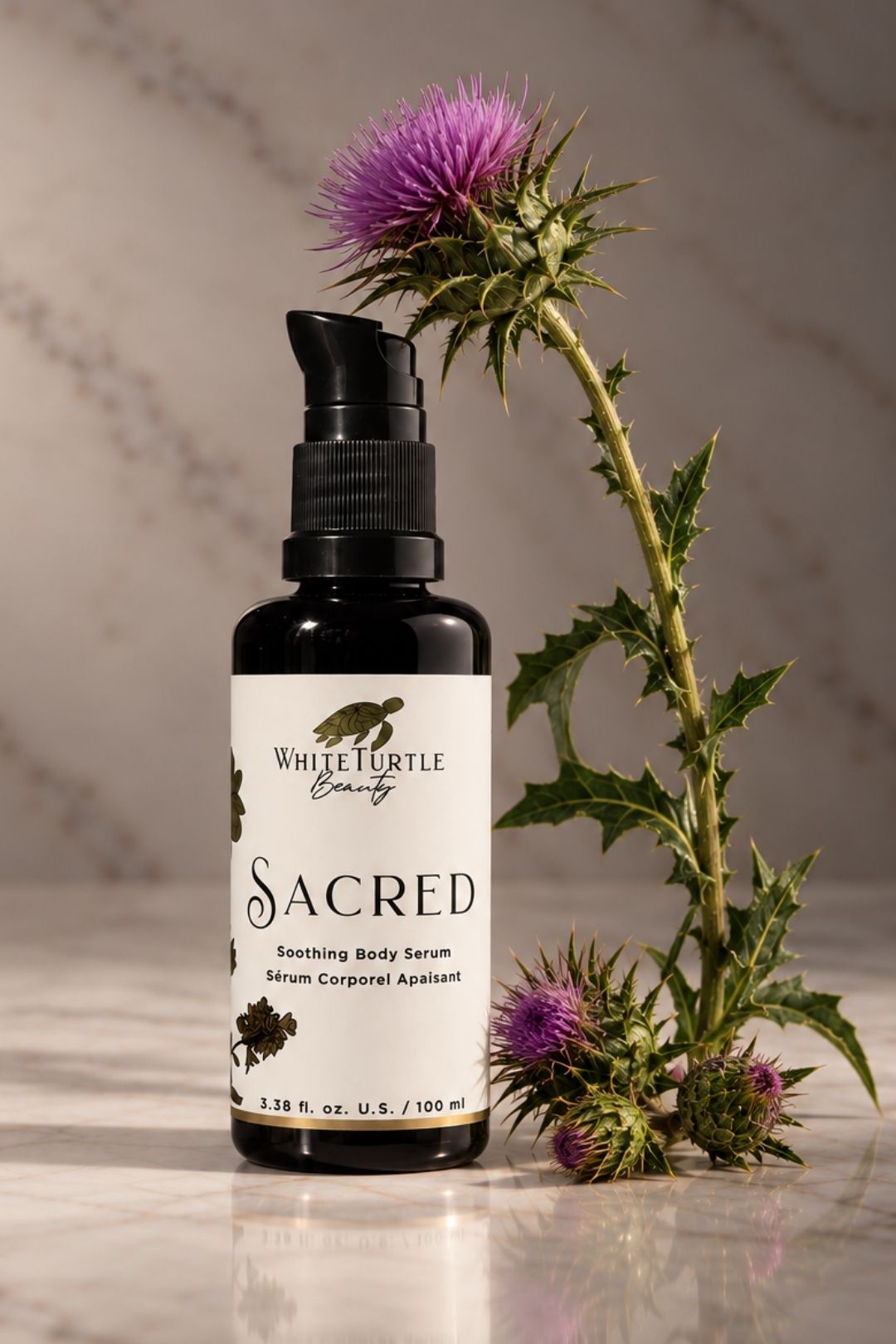 A bottle of White Turtle Beauty Sacred Soothing Body Serum 