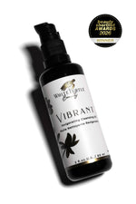 White Turtle Beauty Vibrant product bottle with award badge on a white background