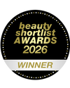 Badge for 'Beauty Shortlist Awards 2026 Winner' with gold text on a black background